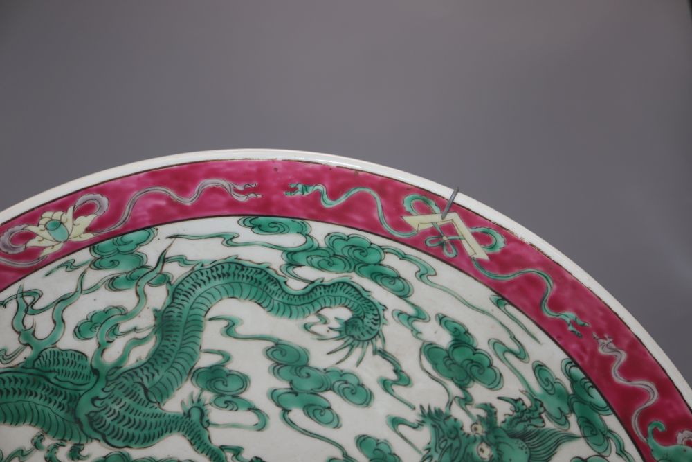 A Japanese porcelain dragon dish, diameter 40cm